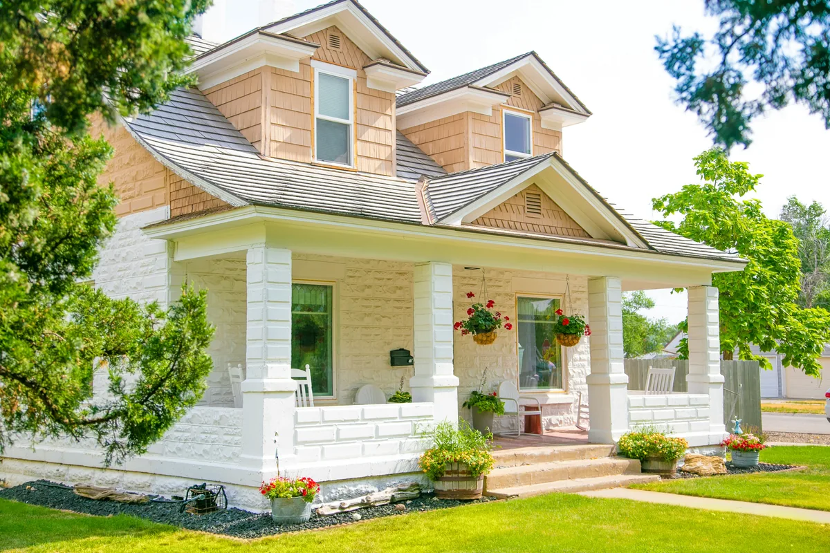 Bright traditional home with a welcoming front porch